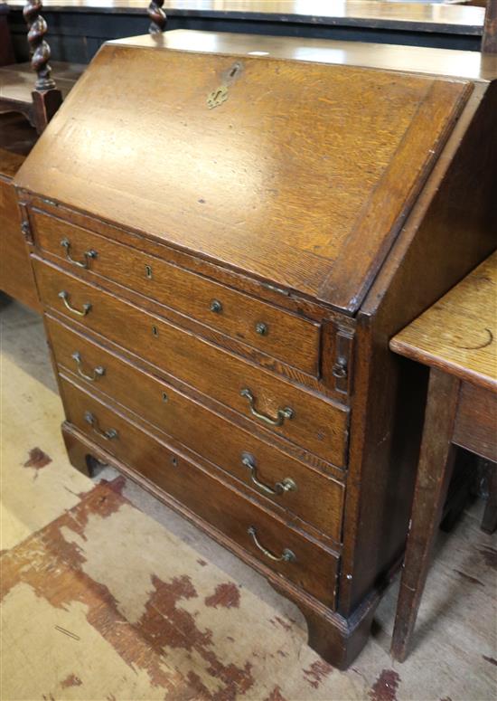 A George III oak bureau